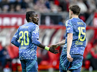 AFC Ajax Amsterdam forward Bertrand Traore and AFC Ajax Amsterdam defender Youri Baas celebrate the 2-2 goal during the match between Twente...