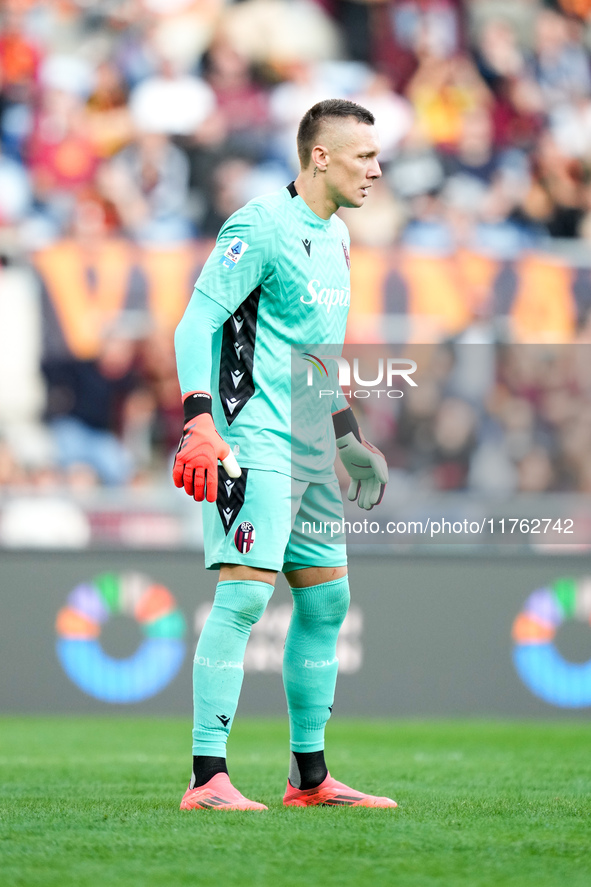 Lukasz Skorupski of Bologna FC looks on during the Serie A Enilive match between AS Roma and Bologna FC at Stadio Olimpico on November 10, 2...