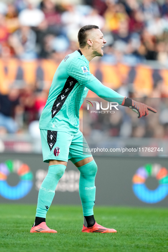 Lukasz Skorupski of Bologna FC gestures during the Serie A Enilive match between AS Roma and Bologna FC at Stadio Olimpico on November 10, 2...