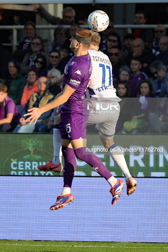 Pietro Comuzzo of ACF Fiorentina and Casper Tengstedt of Hellas Verona FC ,battle for the ball during the Italian Serie A football match bet...