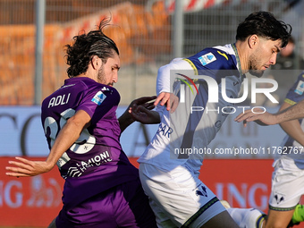 Yacine Adli of ACF Fiorentina and Suat Serdar of Hellas Verona FC ,battle for the ball during the Italian Serie A football match between ACF...