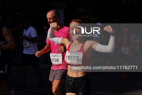 A participant in the Athens Marathon in Athens, Greece, on November 10, 2024, during her race 