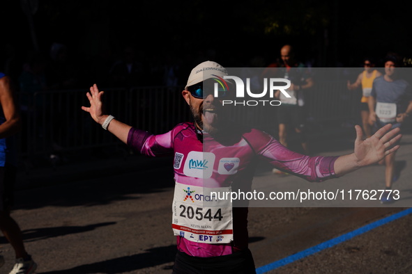 A participant in the Athens Marathon in Athens, Greece, on November 10, 2024, during the race 