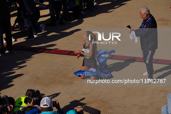 The first female marathon runner, Stefania Noula, finishes the Athens Marathon in Athens, Greece, on November 10, 2024 