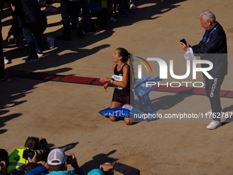 The first female marathon runner, Stefania Noula, finishes the Athens Marathon in Athens, Greece, on November 10, 2024 (