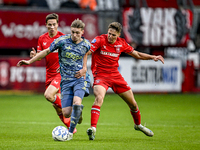 AFC Ajax Amsterdam midfielder Kenneth Taylor and FC Twente midfielder Gijs Besselink play during the match between Twente and Ajax at the Gr...