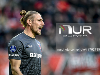 FC Twente goalkeeper Lars Unnerstall plays during the match between Twente and Ajax at the Grolsch Veste stadium for the Dutch Eredivisie se...