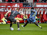 FC Twente goalkeeper Lars Unnerstall and AFC Ajax Amsterdam forward Brian Brobbey play during the match between Twente and Ajax at the Grols...