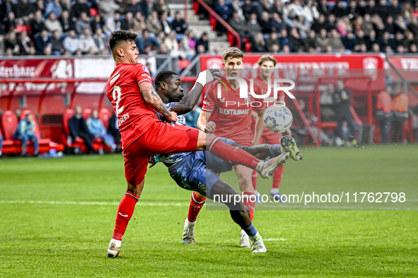 FC Twente defender Mees Hilgers and AFC Ajax Amsterdam forward Brian Brobbey play during the match between Twente and Ajax at the Grolsch Ve...