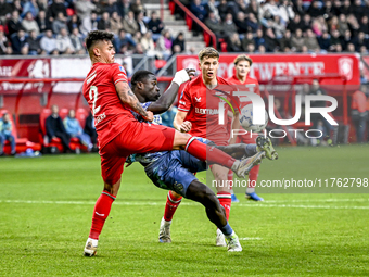 FC Twente defender Mees Hilgers and AFC Ajax Amsterdam forward Brian Brobbey play during the match between Twente and Ajax at the Grolsch Ve...