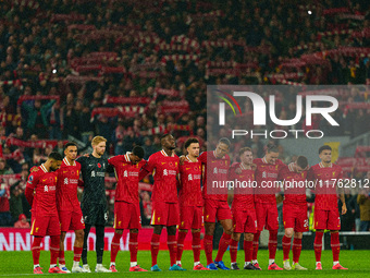 Liverpool's players line up for a minute of silence in remembrance during the Premier League match between Liverpool and Aston Villa at Anfi...