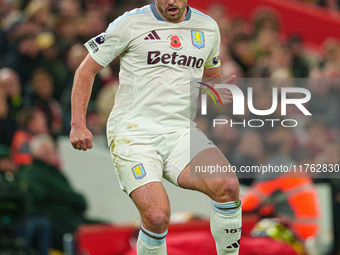 John McGinn of Aston Villa plays during the Premier League match between Liverpool and Aston Villa at Anfield in Liverpool, England, on Nove...