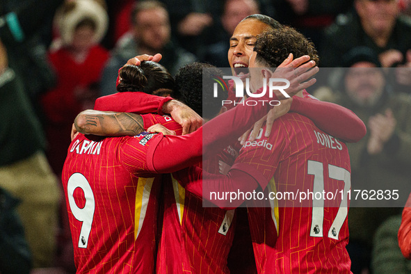 Darwin Nunez celebrates with his teammates after scoring their first goal during the Premier League match between Liverpool and Aston Villa...