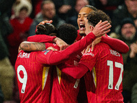 Darwin Nunez celebrates with his teammates after scoring their first goal during the Premier League match between Liverpool and Aston Villa...