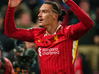 Darwin Nunez of Liverpool celebrates after scoring their first goal during the Premier League match between Liverpool and Aston Villa at Anf...