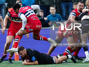 Ollie Fletcher of Newcastle Falcons scores the Falcons' second try during the Premiership Cup Pool A match between Newcastle Falcons and Don...