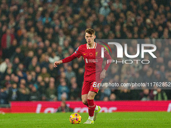 Liverpool's Conor Bradley is in action during the Premier League match between Liverpool and Aston Villa at Anfield in Liverpool, England, o...