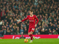 Liverpool's Conor Bradley is in action during the Premier League match between Liverpool and Aston Villa at Anfield in Liverpool, England, o...