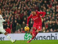 Darwin Nunez of Liverpool shoots at goal during the Premier League match between Liverpool and Aston Villa at Anfield in Liverpool, England,...