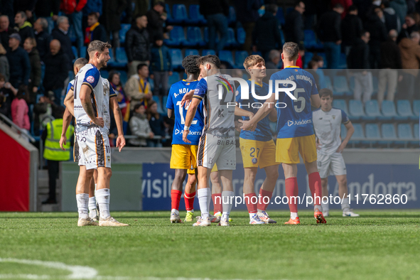 In Andorra La Vella, Andorra, on November 10, 2024, FC Andorra players stand after the Primera RFEF 2024-2025 match between FC Andorra and B...