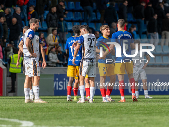 In Andorra La Vella, Andorra, on November 10, 2024, FC Andorra players stand after the Primera RFEF 2024-2025 match between FC Andorra and B...