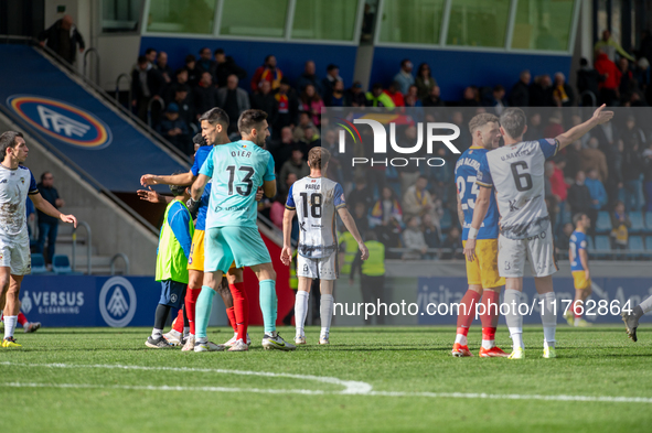 In Andorra La Vella, Andorra, on November 10, 2024, FC Andorra players stand after the Primera RFEF 2024-2025 match between FC Andorra and B...