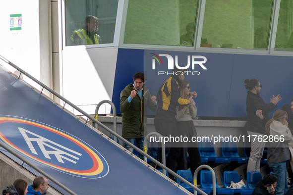 Gerard Pique and his girlfriend Ana Chia are in the official box during the Primera RFEF 2024-2025 match between FC Andorra and Barakaldo CF...