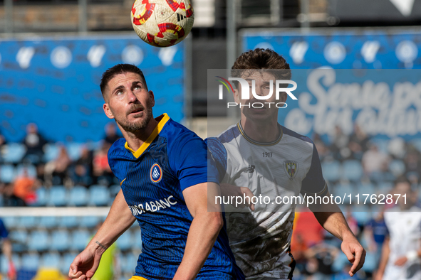 Players are in action during the Primera RFEF 2024-2025 match between FC Andorra and Barakaldo CF at Estadi Nacional in Andorra La Vella, An...