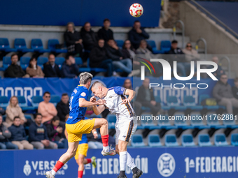 Borja Garcia of Barakaldo CF competes for the ball during the Primera RFEF 2024-2025 match between FC Andorra and Barakaldo CF at Estadi Nac...