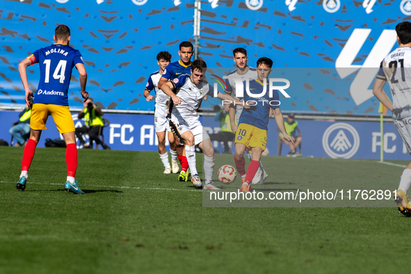 Players are in action during the Primera RFEF 2024-2025 match between FC Andorra and Barakaldo CF at Estadi Nacional in Andorra La Vella, An...