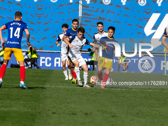 Players are in action during the Primera RFEF 2024-2025 match between FC Andorra and Barakaldo CF at Estadi Nacional in Andorra La Vella, An...