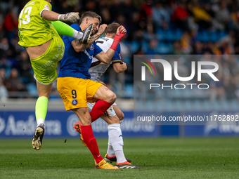 Players are in action during the Primera RFEF 2024-2025 match between FC Andorra and Barakaldo CF at Estadi Nacional in Andorra La Vella, An...