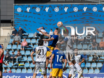 Players are in action during the Primera RFEF 2024-2025 match between FC Andorra and Barakaldo CF at Estadi Nacional in Andorra La Vella, An...