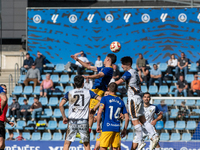 Players are in action during the Primera RFEF 2024-2025 match between FC Andorra and Barakaldo CF at Estadi Nacional in Andorra La Vella, An...