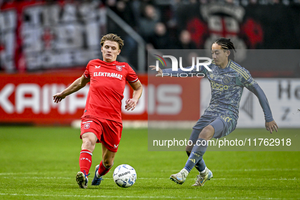 FC Twente midfielder Sem Steijn and AFC Ajax Amsterdam midfielder Kian Fitz-Jim play to a final result of 2-2 during the match between Twent...