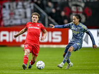 FC Twente midfielder Sem Steijn and AFC Ajax Amsterdam midfielder Kian Fitz-Jim play to a final result of 2-2 during the match between Twent...