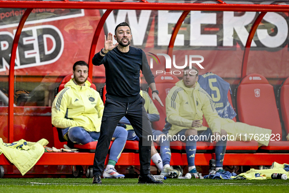 AFC Ajax Amsterdam trainer Francesco Fariolo observes the final result of 2-2 during the match between Twente and Ajax at the Grolsch Veste...