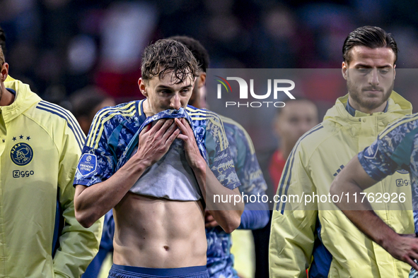 AFC Ajax Amsterdam defender Youri Baas feels disappointed after the match, with a final result of 2-2, during the match between Twente and A...