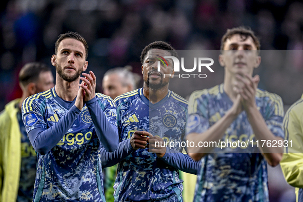 AFC Ajax Amsterdam midfielder Branco van den Boomen and AFC Ajax Amsterdam forward Chuba Akpom play in a match that ends with a final result...