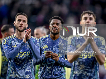 AFC Ajax Amsterdam midfielder Branco van den Boomen and AFC Ajax Amsterdam forward Chuba Akpom play in a match that ends with a final result...