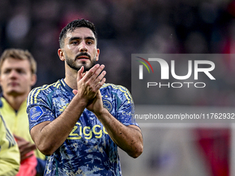 AFC Ajax Amsterdam defender Josip Sutalo feels disappointed after the match, with a final result of 2-2, during the match between Twente and...