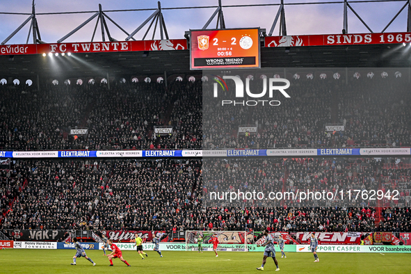 The scoreboard shows the final result of 2-2 during the match between Twente and Ajax at the Grolsch Veste stadium for the Dutch Eredivisie...