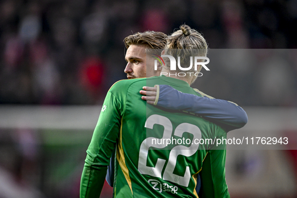 AFC Ajax Amsterdam midfielder Kenneth Taylor and AFC Ajax Amsterdam goalkeeper Remko Pasveer participate in a match that ends with a final r...