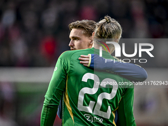 AFC Ajax Amsterdam midfielder Kenneth Taylor and AFC Ajax Amsterdam goalkeeper Remko Pasveer participate in a match that ends with a final r...