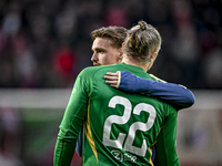 AFC Ajax Amsterdam midfielder Kenneth Taylor and AFC Ajax Amsterdam goalkeeper Remko Pasveer participate in a match that ends with a final r...