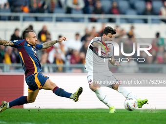 Riccardo Orsolini of Bologna FC scores second goal during the Serie A Enilive match between AS Roma and Bologna FC at Stadio Olimpico on Nov...