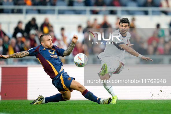 Riccardo Orsolini of Bologna FC scores second goal during the Serie A Enilive match between AS Roma and Bologna FC at Stadio Olimpico on Nov...