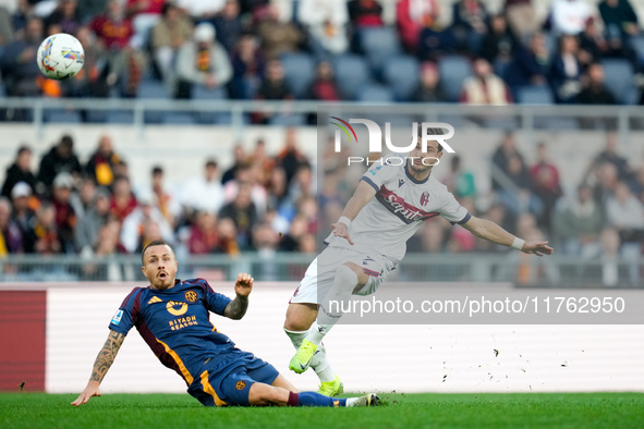 Riccardo Orsolini of Bologna FC scores second goal during the Serie A Enilive match between AS Roma and Bologna FC at Stadio Olimpico on Nov...