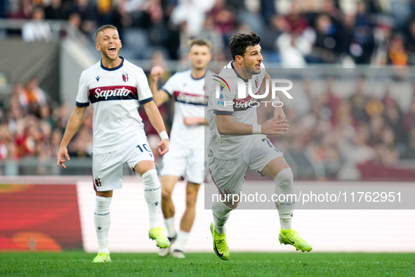 Riccardo Orsolini of Bologna FC celebrates after scoring second goal during the Serie A Enilive match between AS Roma and Bologna FC at Stad...