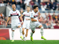 Riccardo Orsolini of Bologna FC celebrates after scoring second goal during the Serie A Enilive match between AS Roma and Bologna FC at Stad...